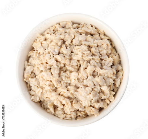 Tasty boiled oatmeal in bowl isolated on white, top view