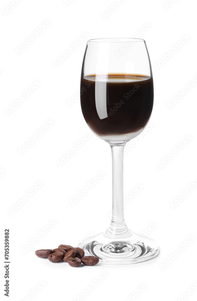 Shot glass with coffee liqueur and beans isolated on white Shot glass with coffee liqueur and beans isolated on white