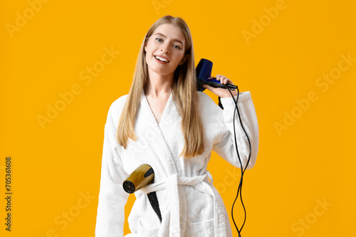 Young blonde woman with hai...