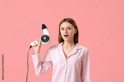 Surprised young woman with ...