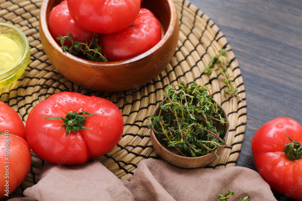 Bowl with fresh tomatoes on wooden background Bowl with fresh tomatoes on wooden background