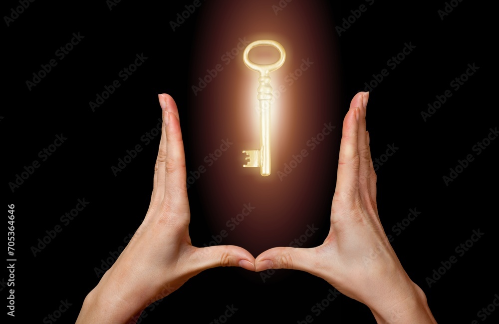 Human hand hold the key to apartment - obrazy, fototapety, plakaty 