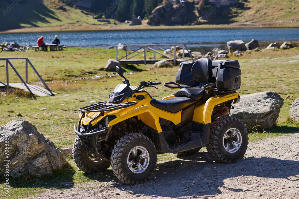Yellow modern quad in nature ready for driving Yellow modern quad in nature ready for driving