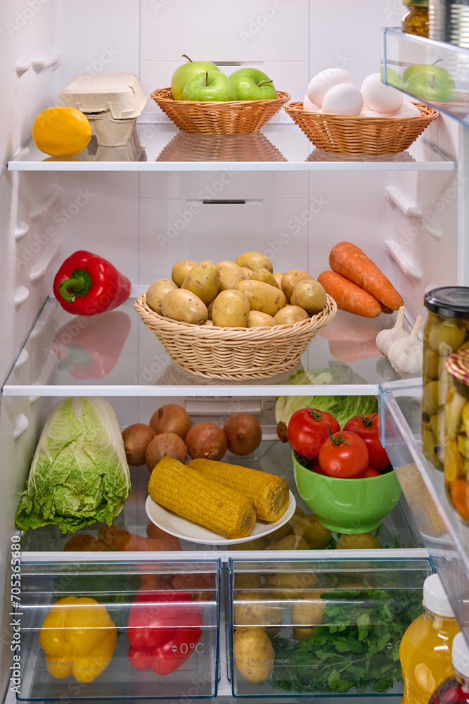 Open fridge full of fresh fruits and vegetables, organic nutrition, 