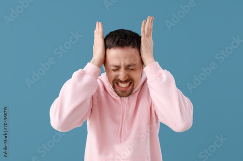 Young man having panic atta...