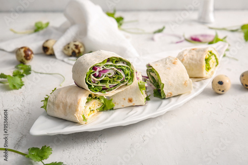 Plate of tasty lavash rolls...