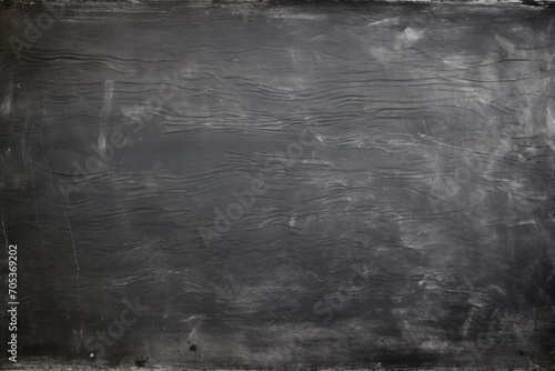 texture of dirty dark school blackboard with stains of chalk lines and school chalk eraser - Generative AI photo