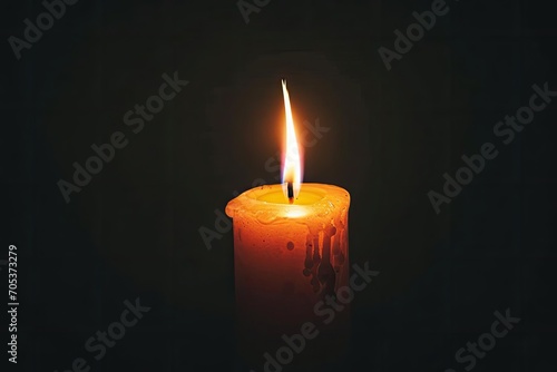 Single candle flame flickering in a dark room photo
