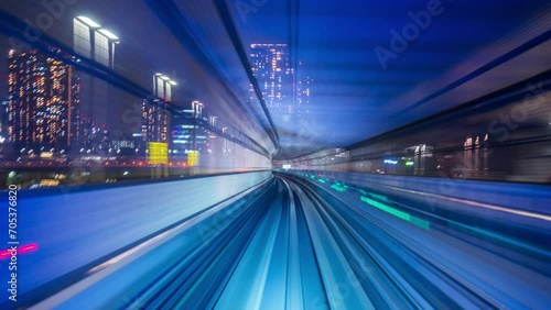 Time lapse of automatic train moving to tunnel in Tokyo, Japan. photo