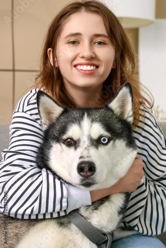 Happy young woman with husk...
