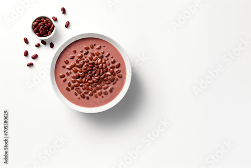 Warm red bean soup on a white background with copy space