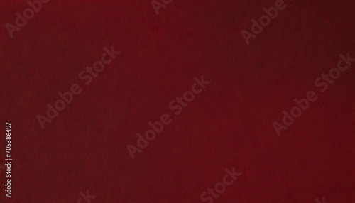 A rich maroon paper texture with subtle and organic patterns, ideal for adding a touch of luxury and depth to designs