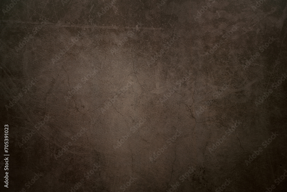 Dark concrete background with cracks and scratches