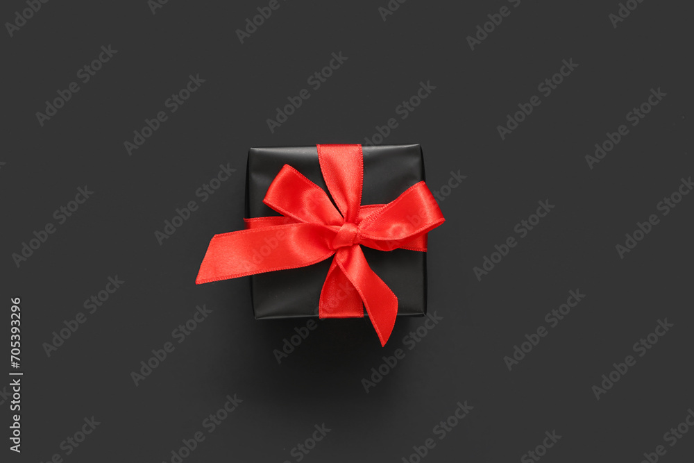 Gift box on dark background. Black Friday