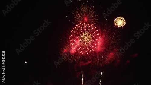 Golden fireworks that actually shine with bokeh lights in the night sky. Fiery fireworks display Fireworks celebration to bid farewell to the old year and welcome the new year