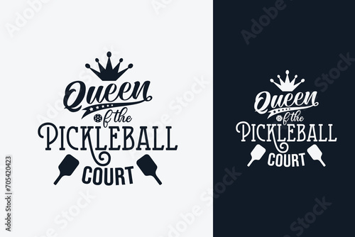 queen of the pickleball court text art with a combination of beautiful lettering  crown  paddles  and a ball on the letter o. This is suitable for t-shirts  stickers  posters  etc.