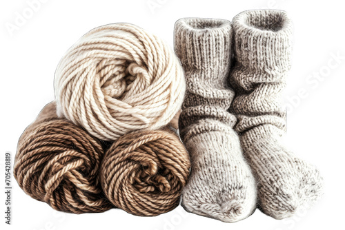 three skeins of yarn and a pair of knitted socks
