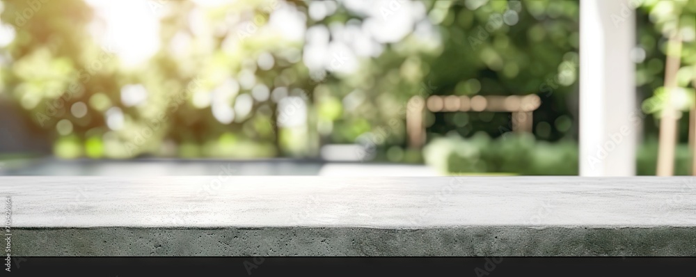 Rustic elegance in nature. Empty stone table in beautiful garden providing stunning background for design and display perfect for summer relaxation Rustic elegance in nature. Empty stone table in beautiful garden providing stunning background for design and display perfect for summer relaxation