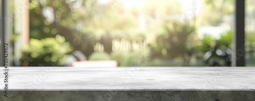 Rustic elegance in nature. Empty stone table in beautiful garden providing stunning background for design and display perfect for summer relaxation