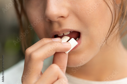 girl chews gum. Man face, opening mouth for chewing gum, mint taste, refreshing breathe. fresh breath. Bad breath. nicotine gum