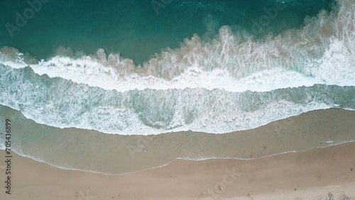 Tableau sur toile Aerial view of sandy tropical beach and surfer in summer at Eastern Australia, Q