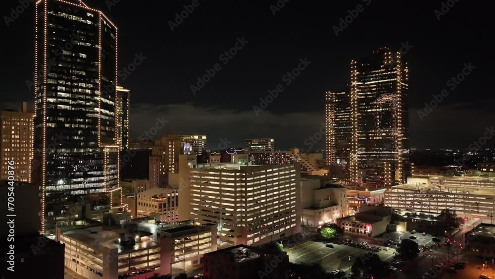 Fort Worth, Texas skyline at night with drone video moving up close up. Fort Worth, Texas skyline at night with drone video moving up close up.
