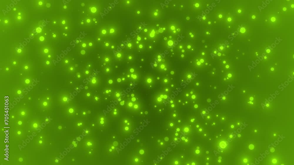 Lime green color Moving glitter particles simple background Lime green color Moving glitter particles simple background
