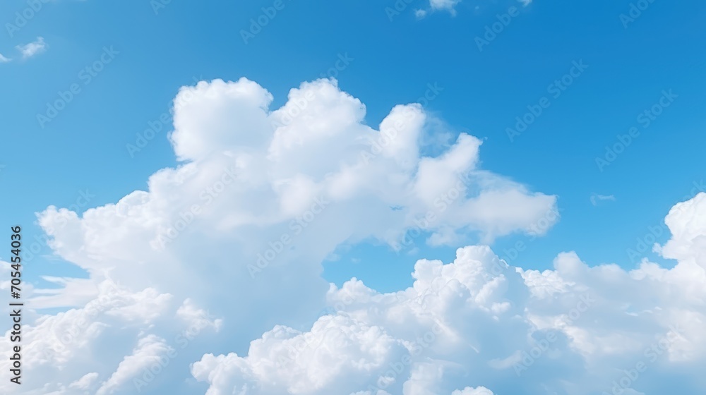 White fluffy clouds float across the blue sky during the daytime. The beautiful sky is moving full of airy snow-white clouds. White fluffy clouds float across the blue sky during the daytime. The beautiful sky is moving full of airy snow-white clouds.