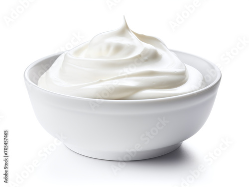 Fresh greek yougurt in a bowl isolated on white background.
