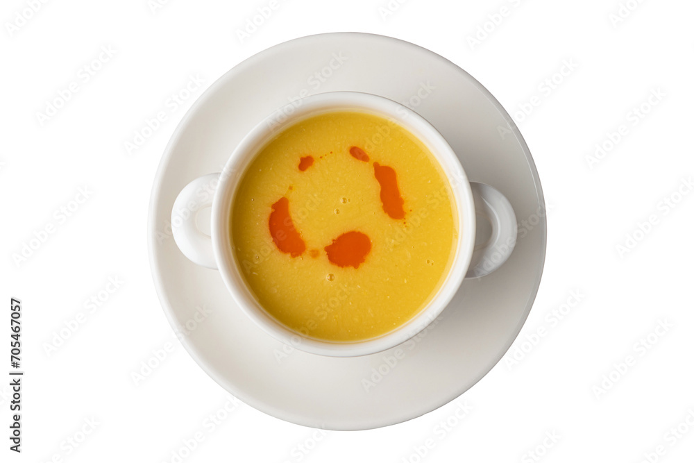 Strained lentil soup on a white porcelain plate Strained lentil soup on a white porcelain plate