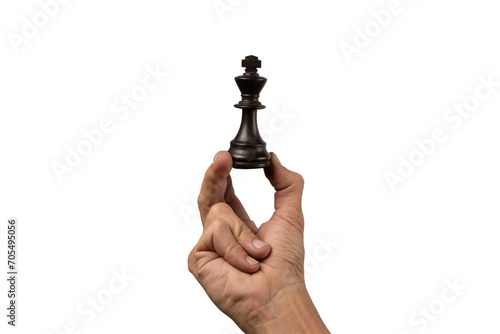 Male hand holding king chess figure isolated.