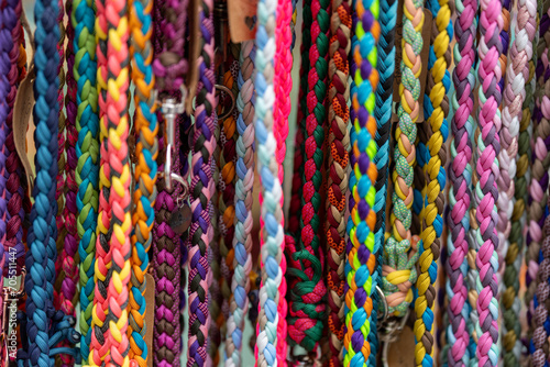 Colorful braids of different colors for sale in the market.