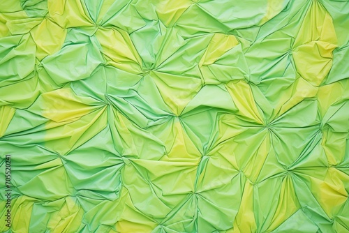 green crumpled paper with soft folds