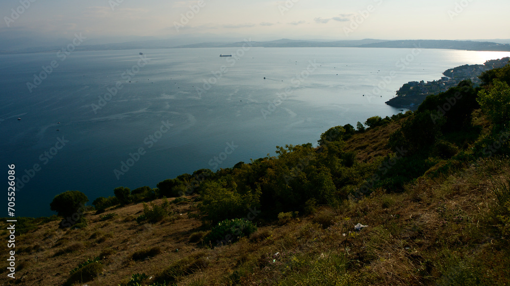 Northern Türkiye, Black Sea off the coast of Sinop. View of the Black Sea from the rocky mountain peak. Skyline, sea and rocky hill.