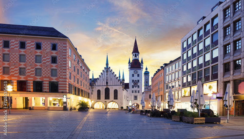 Munich Old town, Marienplatz square and the Old Town Hall tower, Germany, on dramatical sunrise