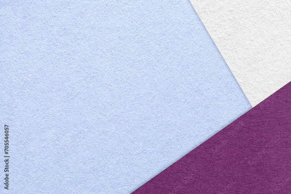 Texture of craft light blue color paper background with white and purple border. Vintage abstract very peri cardboard. Texture of craft light blue color paper background with white and purple border. Vintage abstract very peri cardboard.