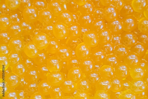 Closeup of yellow bobas for the preparation of bubble tea.