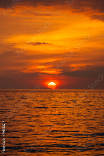 Sunset on the Andaman Sea at Yao Beach west coast of Thailand  Hat Chao Mai National Park Trang Province Thailand.