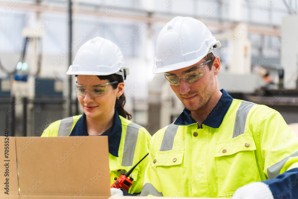 Professional worker team in safety uniform, supervisor inspector in packaging stock order at cardboard factory warehouse, piles of stacking paper manufacture, recycling industrial production Professional worker team in safety uniform, supervisor inspector in packaging stock order at cardboard factory warehouse, piles of stacking paper manufacture, recycling industrial production