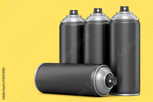 Set of spray paint cans on yellow background. Spray bottle and dispenser