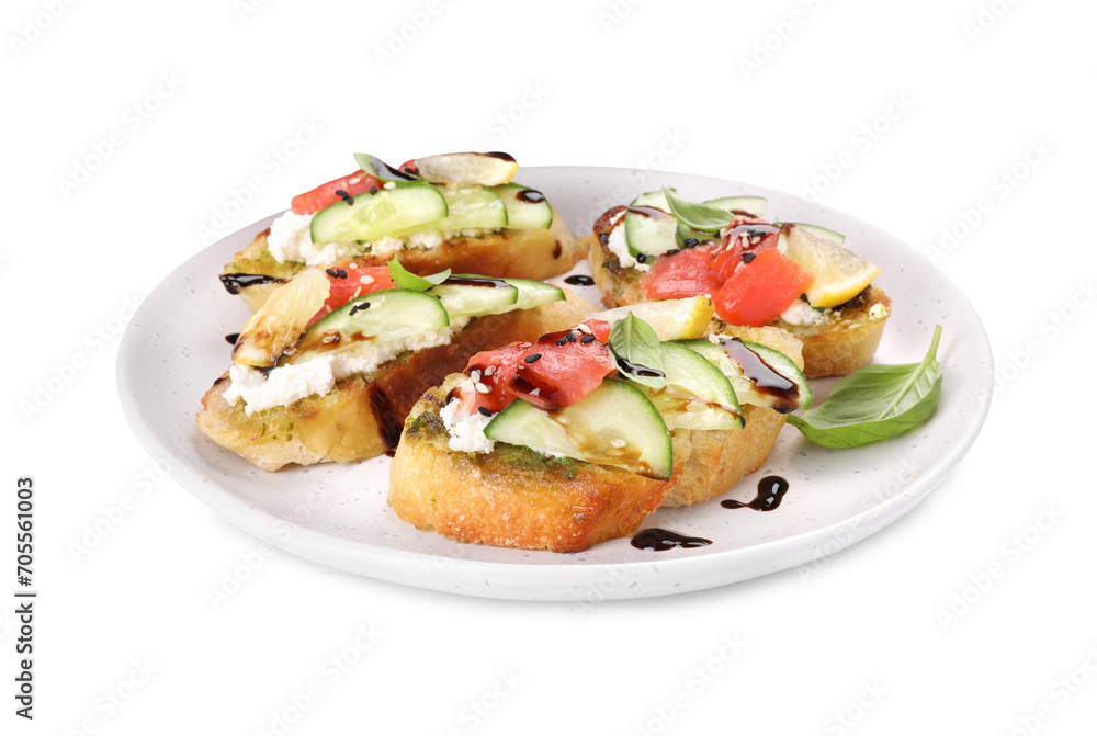 Delicious bruschettas with balsamic vinegar and toppings isolated on white
