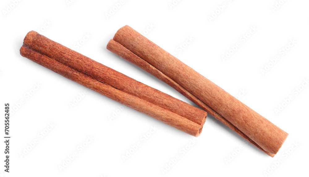 Aromatic cinnamon sticks isolated on white, top view
