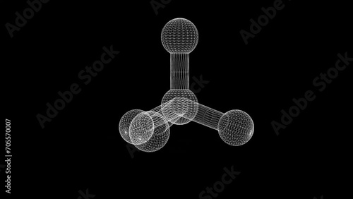 Spinning 3d wireframe tetrahedral bond on plain black background photo