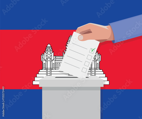 Cambodia election concept. Hand puts vote bulletin