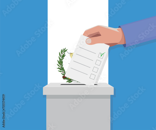 Guatemala election concept. Hand puts vote bulletin
