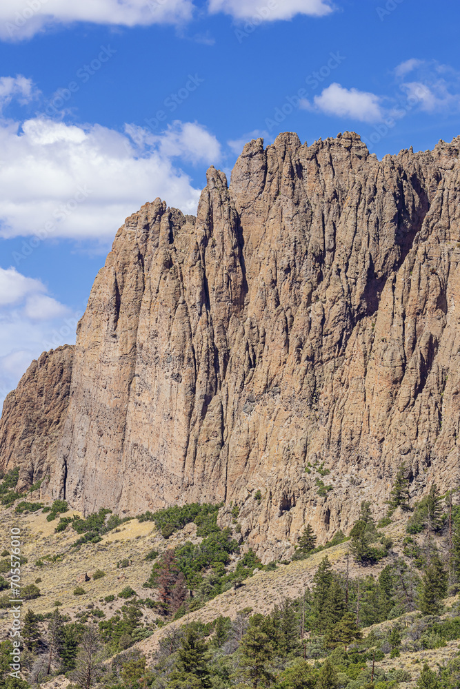The massive wall of the Dillon Pinnacles in the Curecanti National Recreation Area
