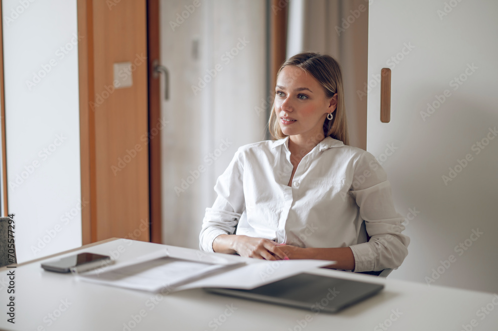 Cute blonde young wo,an working with documents Cute blonde young wo,an working with documents