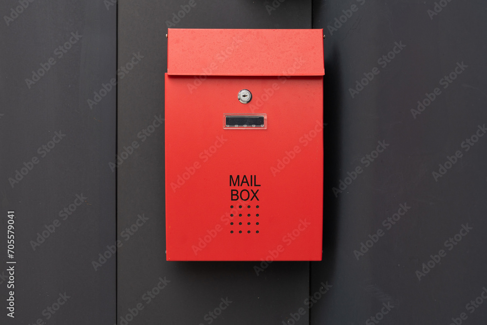 red mail box on a wall red mail box on a wall