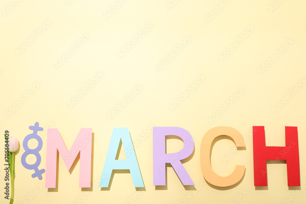 The inscription of March in large multi-colored letters The inscription of March in large multi-colored letters