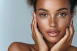 skin care and cosmetics concepts, african american girl with beautiful face touching healthy skin